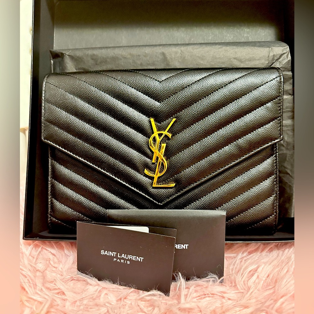Authentic YSL wristlet pouch.